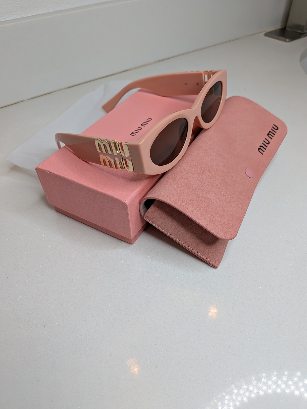 Miu Miu Pink Cat-Eye Sunglasses with Gold Logo Accent - Picture 5 of 12